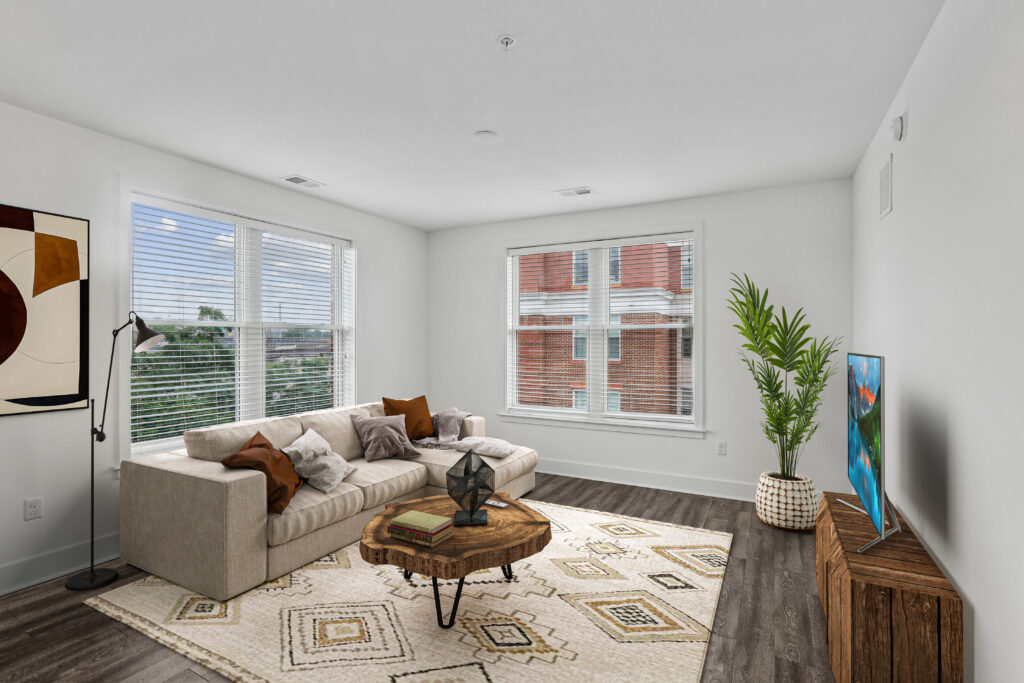 Open concept living room with large windows